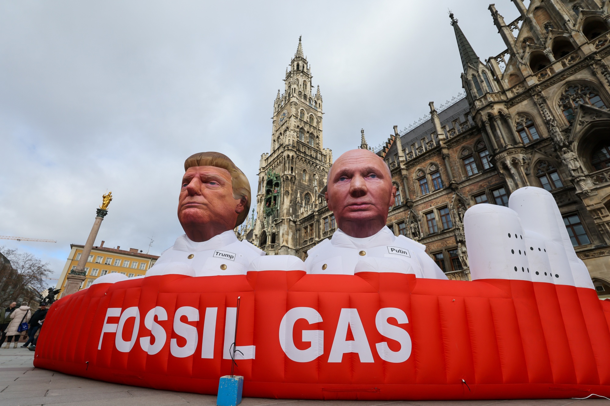 Inflatable models depicting US President Donald Trump, left, and Russia's President Vladimir Putin, right, during a protest by Greenpeace near the Munich Security Conference in Munich, Germany, on Friday, Feb. 13, 2026. Nuclear deterrence is set to be a hot topic at the conference. Photographer: Alex Kraus/Bloomberg