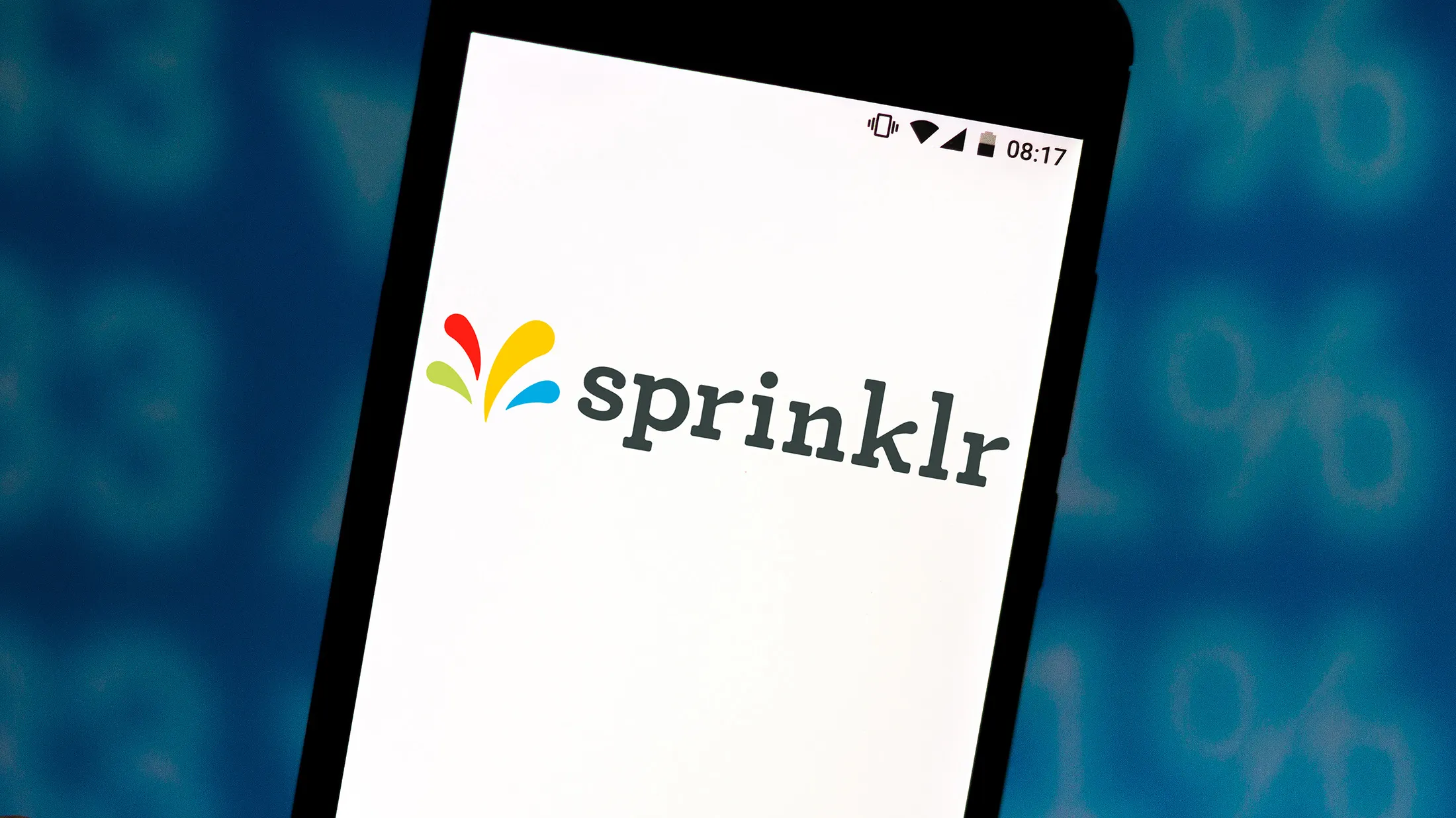 In this photo illustration a Sprinklr logo seen displayed on