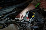 A mechanic inspects a vehicle's engine at an automotive shop in Oklahoma City, Oklahoma, US, on Friday, Dec. 12, 2025. First Brands needs new, higher-priority money to stabilize operations and purchase inventory, with any new senior financing requiring the approval of two-thirds of current rescue loan holders.