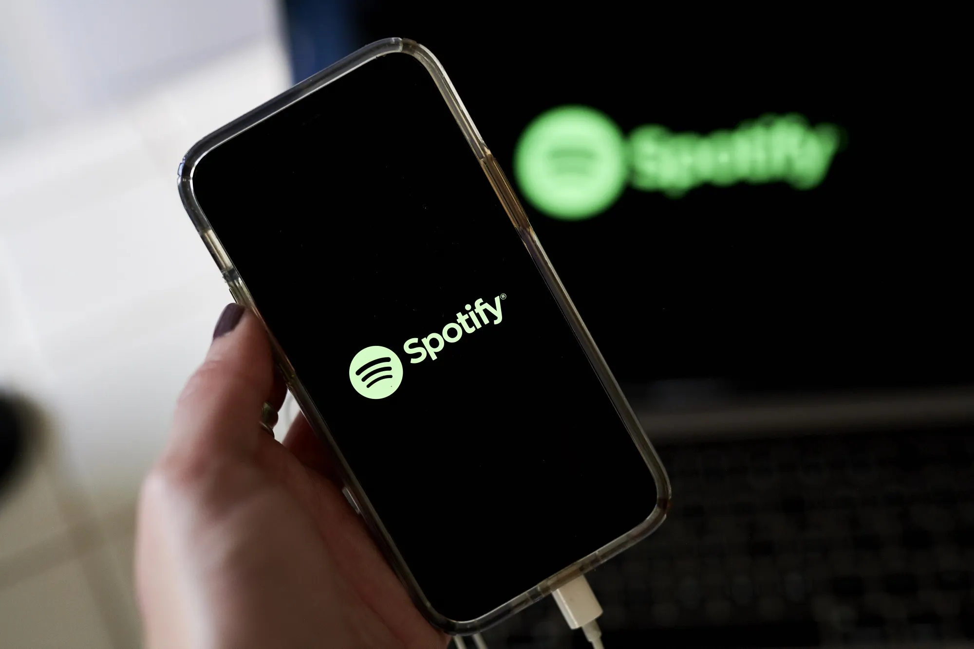 The Spotify logo on a smartphone arranged in Saint Thomas, U.S. Virgin Islands, on Saturday, Jan. 29, 2022.