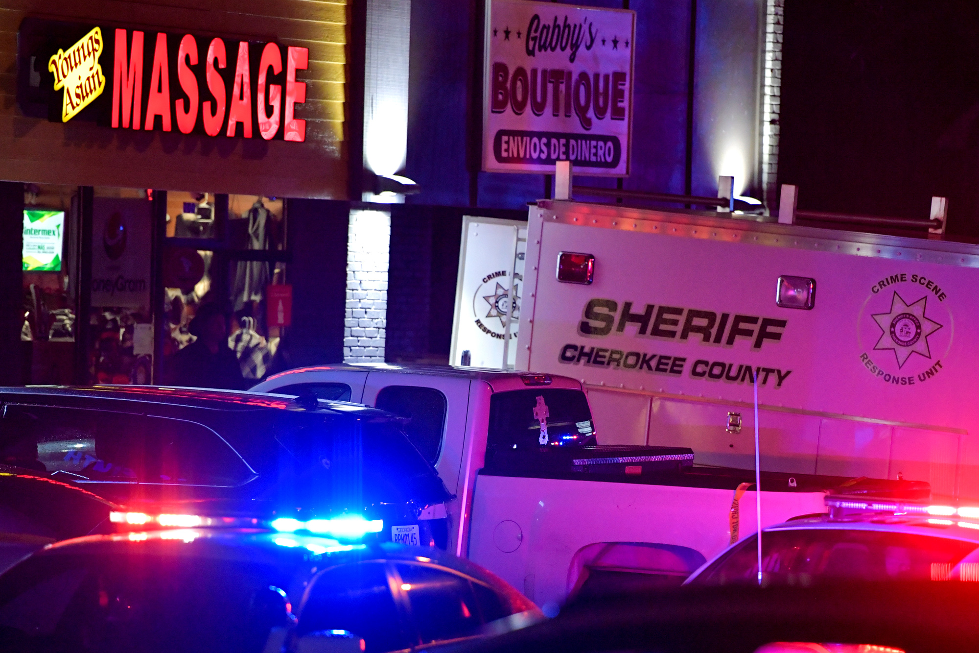 Emergency services attend the scene of a fatal shooting in Acworth, Georgia, U.S., on March 16.