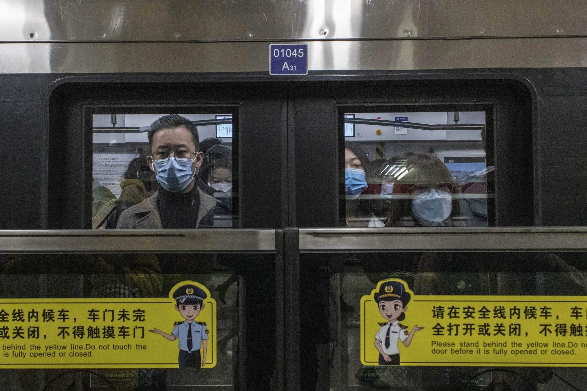 Morning commuters in the subway in Beijing earlier in November.&nbsp;