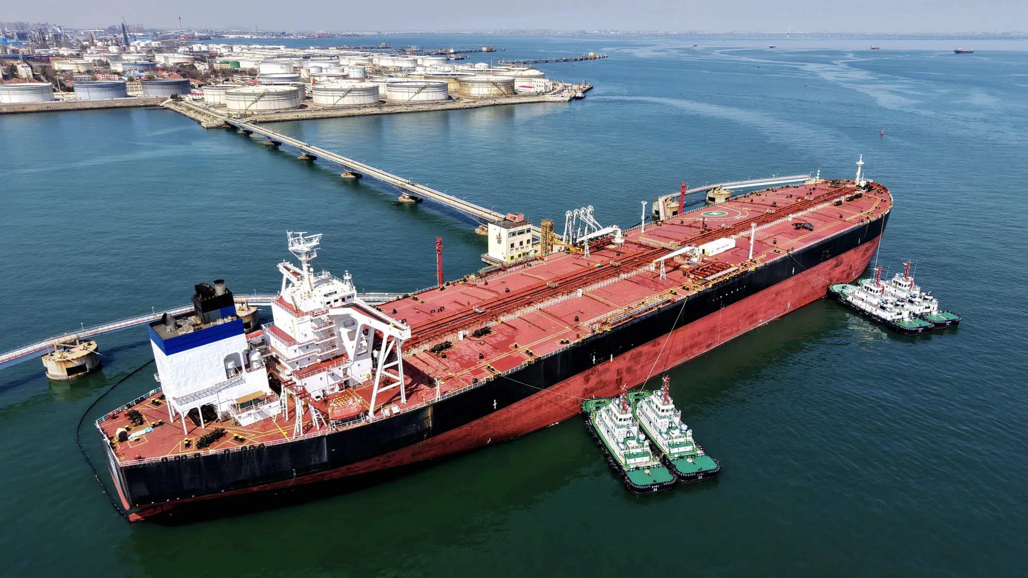 An oil tanker docked unloading crude oil at the port in Qingdao, China on April 7.