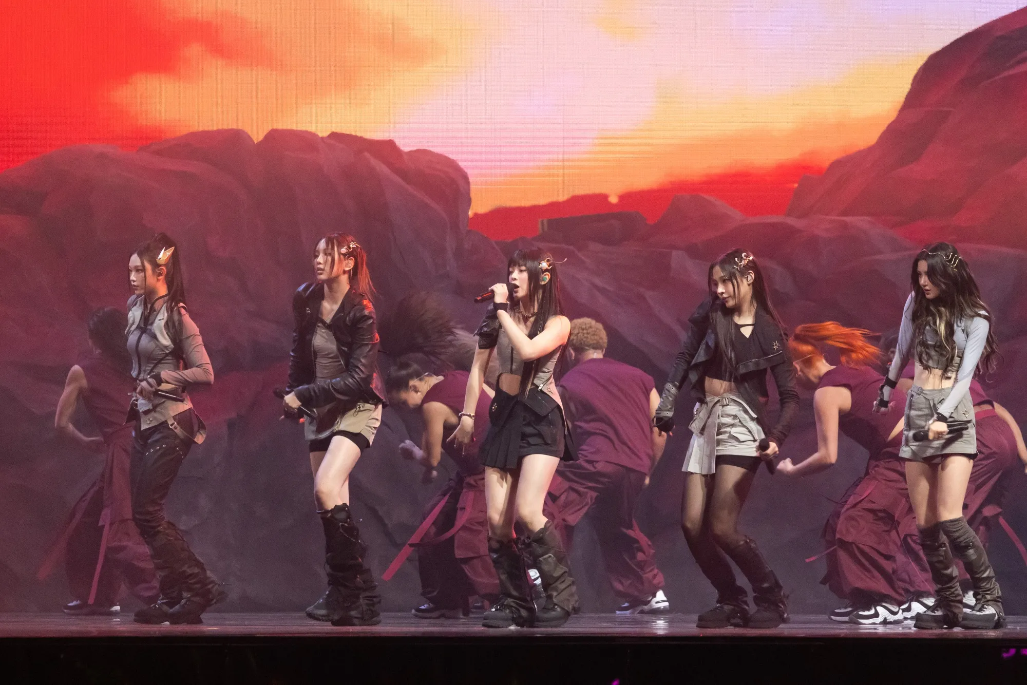 K-pop girl group NewJeans perform in 2023.