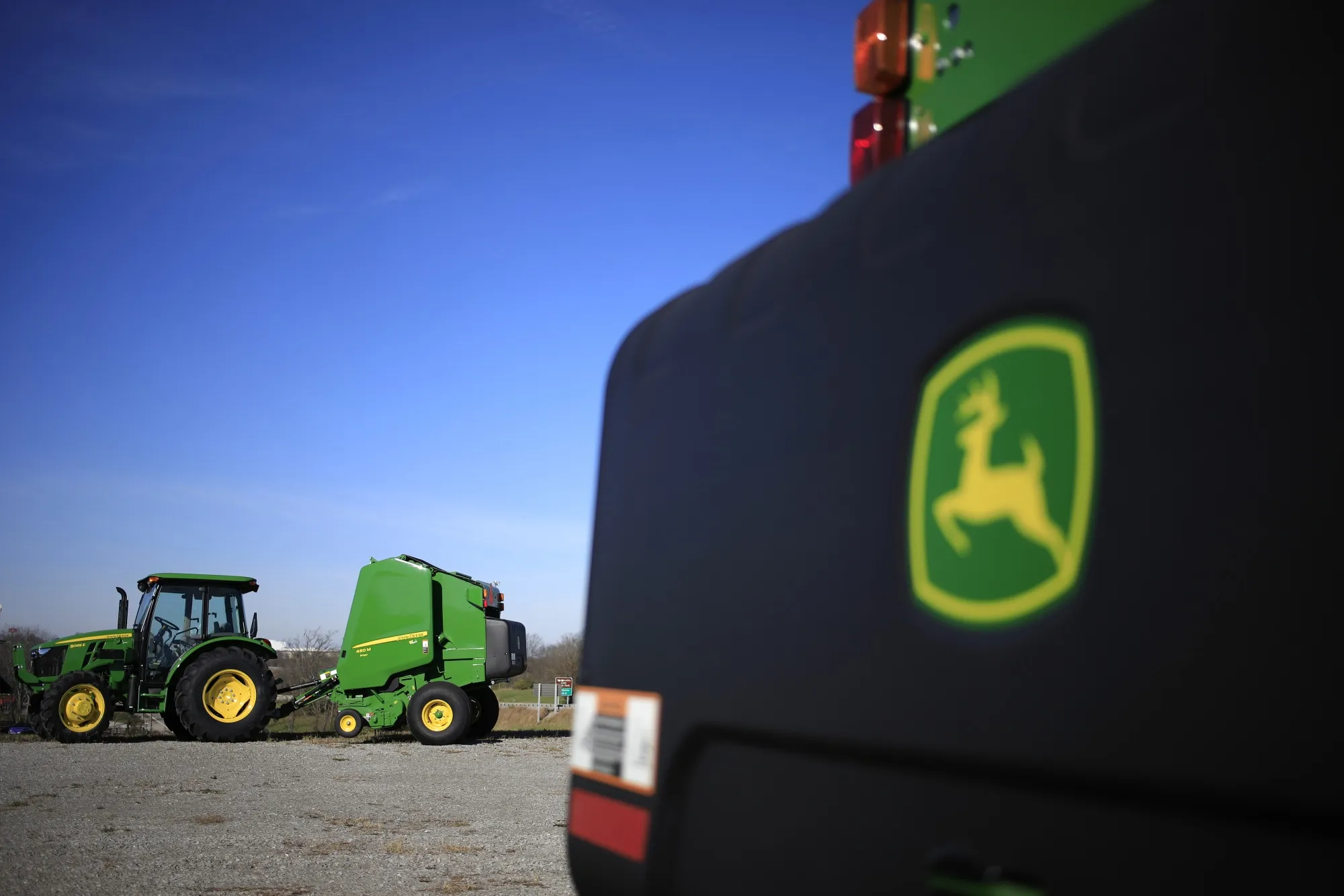 A tractor and round baler at a John Deere dealership in Shelbyville, Kentucky.