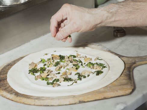 The clam pizza in progress.