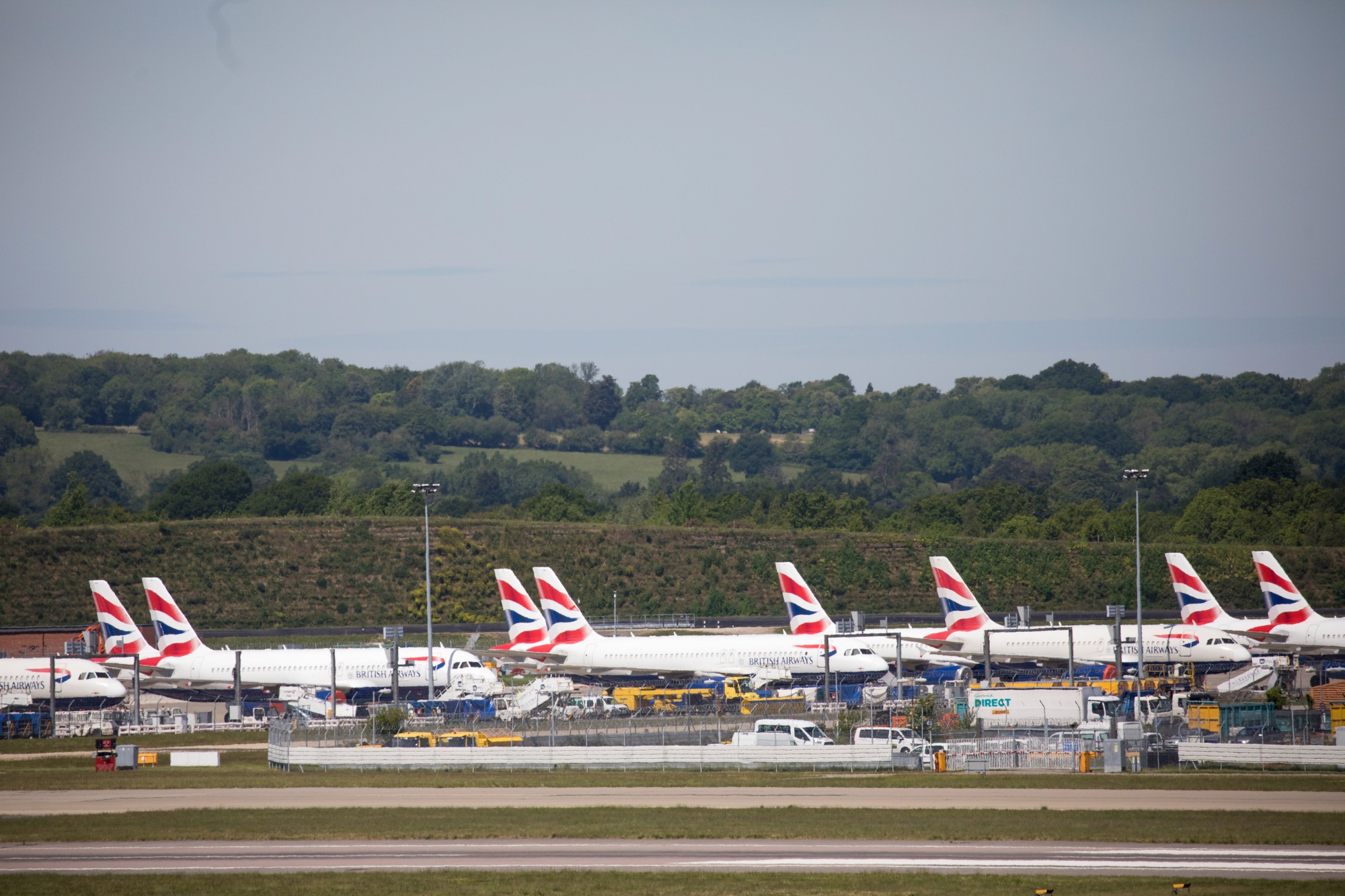 British Airways pkanes on the tarmac at London Gatwick Airport.