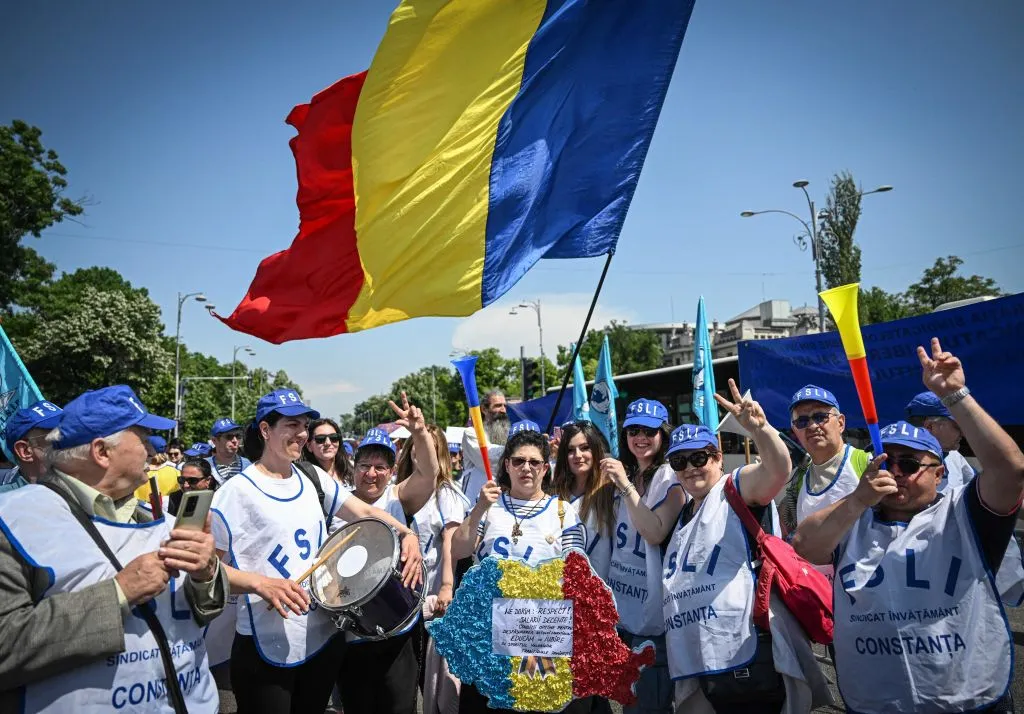 Romanian teachers protest in front of the Romanian Government headquarters in Bucharest, on May 25