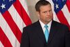 Kansas Secretary of State Kris Kobach listens as President Trump speaks at the first meeting of the Presidential Advisory Commission on Election Integrity in Washington on July 19, 2017.&nbsp;
