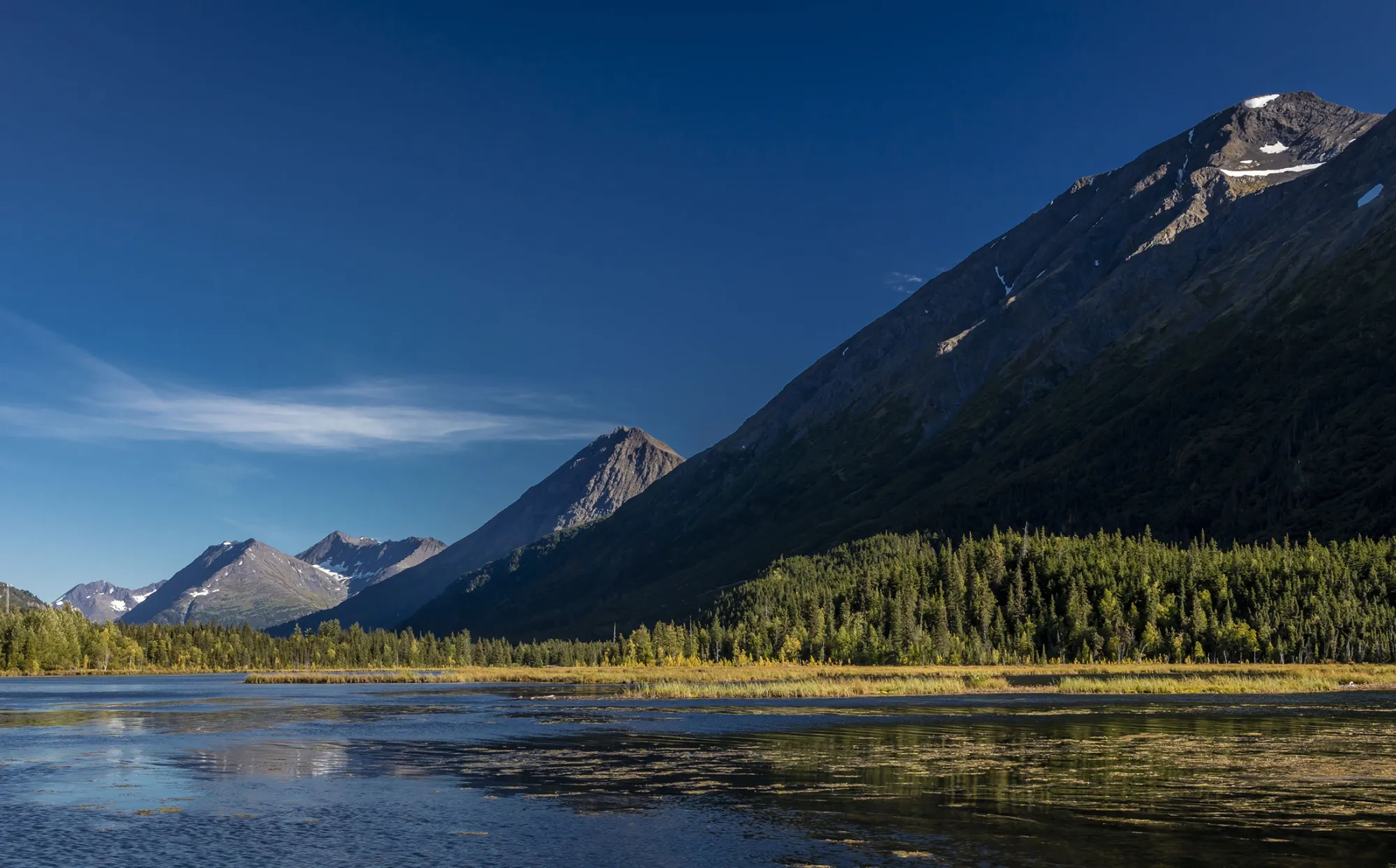 The Kenai Mountains stand next to&nbsp;Tern Lake on the Kenai Peninsula in Alaska.&nbsp;
