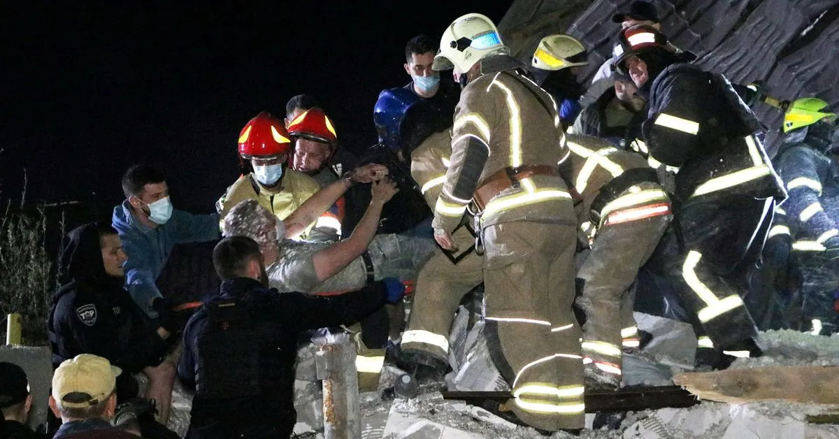 Emergency workers dig in the rubble of residential housing in the town of Pidhorodne, June 3.&nbsp;