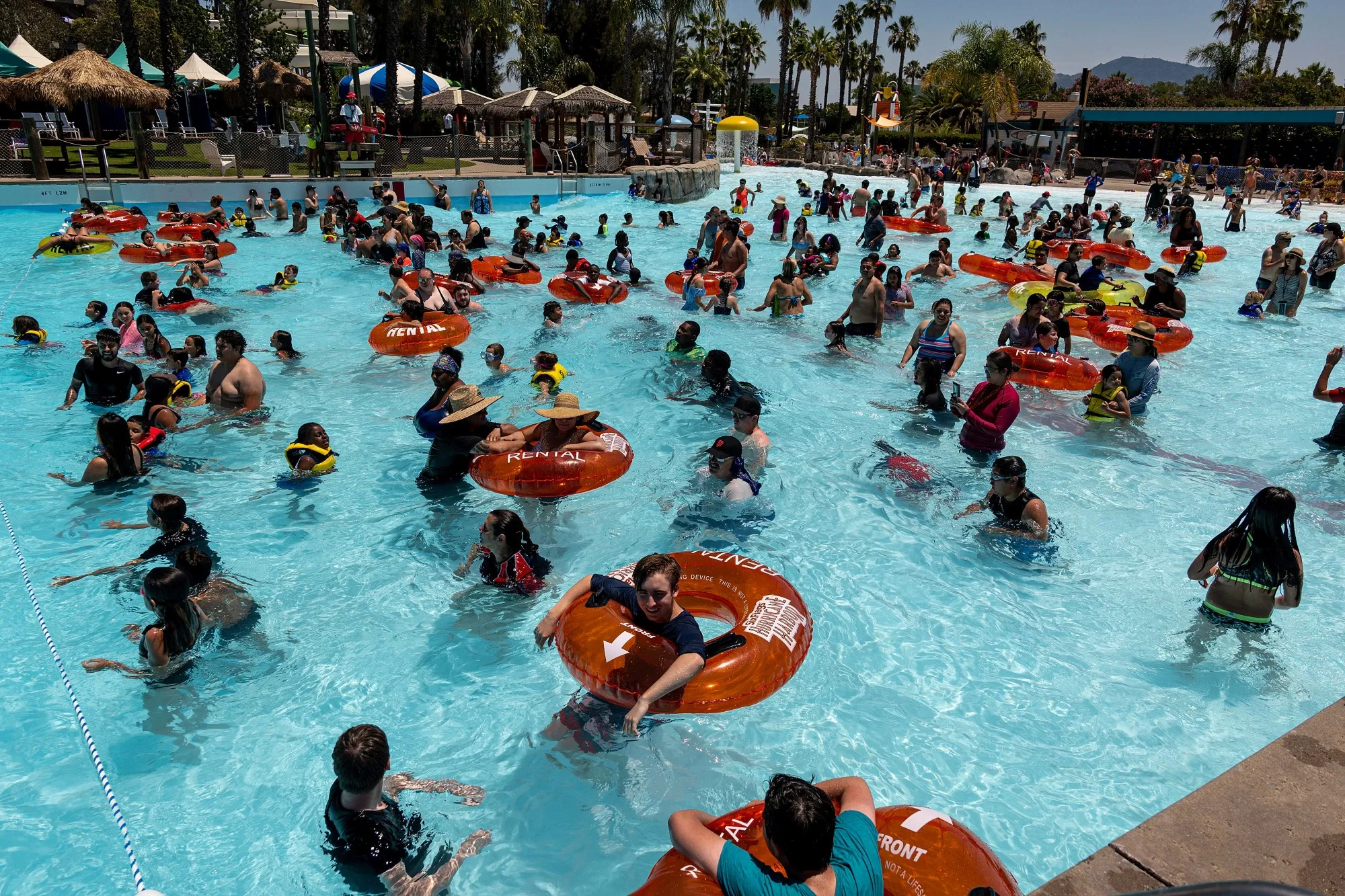 People cool off at a water park in Concord, California during the latest heatwave.
