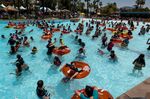 People cool off at a water park in Concord, California during the latest heatwave.