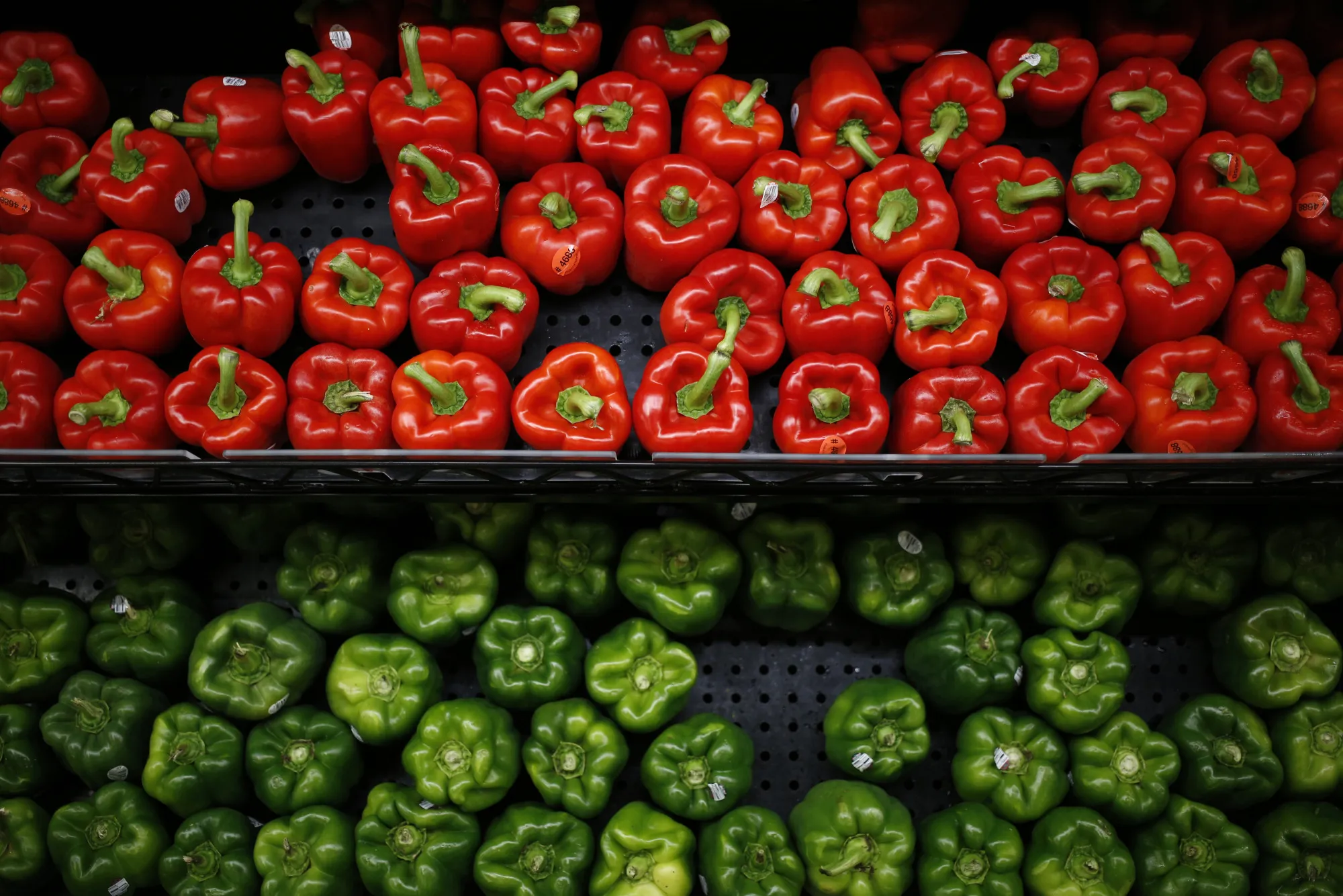Bell peppers are displayed for sale inside a Kroger Co. grocery store in Louisville, Kentucky, U.S., on Wednesday, June 14, 2017. Kroger Co. is scheduled to release earnings on June 15.