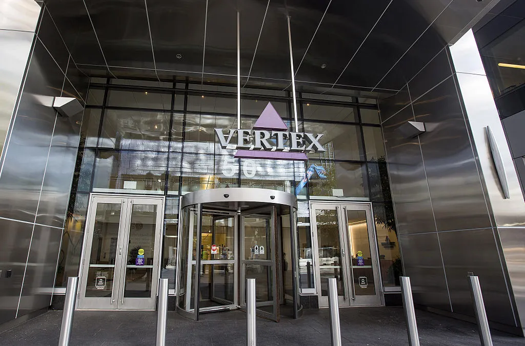 Vertex Pharmaceuticals Inc. signage is displayed at the entrance to the company's building in Boston, Massachusetts, U.S., on Wednesday, Oct. 19, 2016.
