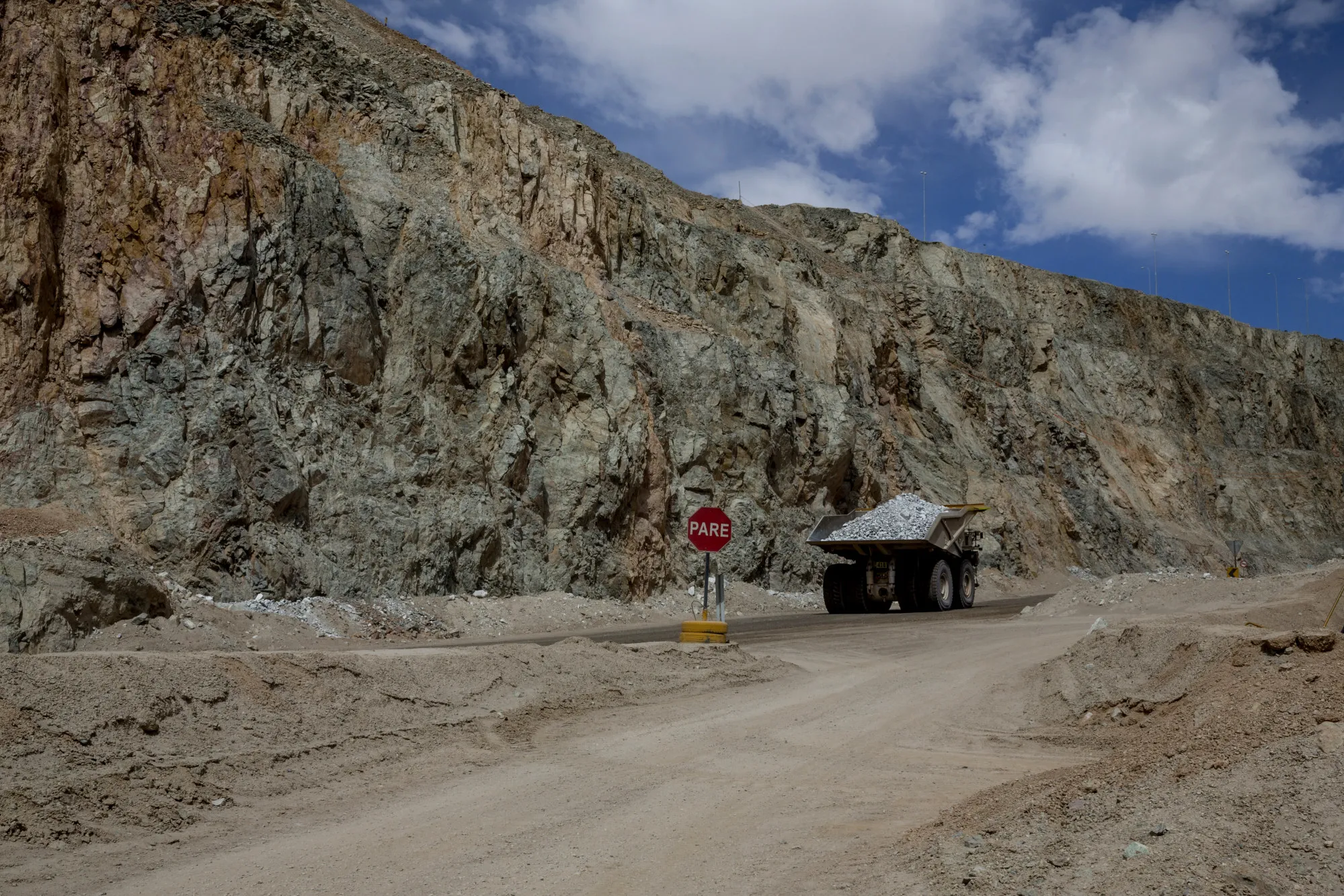 A truck transports minerals inside an open pit copper mine near Calama, Chile.