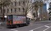 A sign on a truck warns people to stay home in Melbourne on Aug. 5.