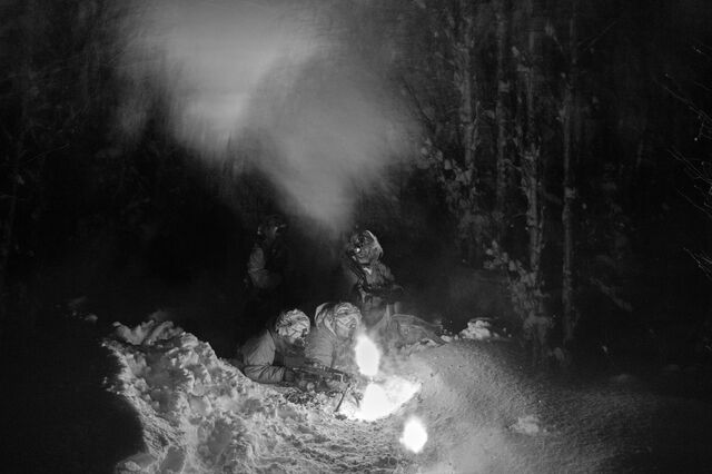 Soldiers with the 11th Airborne Division execute a nighttime assault.