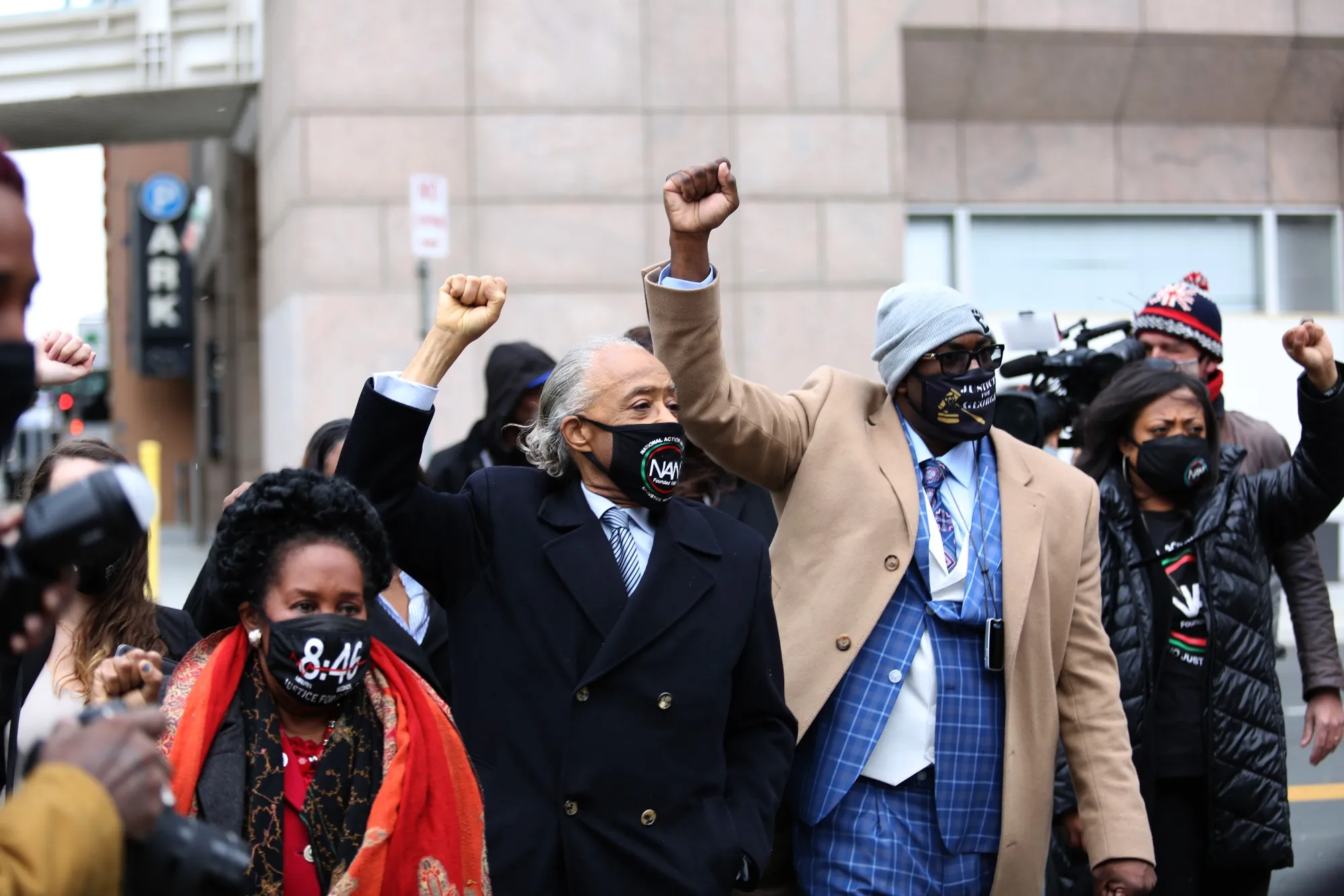 Reverend Al Sharpton, center, and Philonise Floyd, George Floyd's brother, second right, arrive at the Hennepin County Government Center in Minneapolis, Minnesota, on&nbsp;April 19.&nbsp;