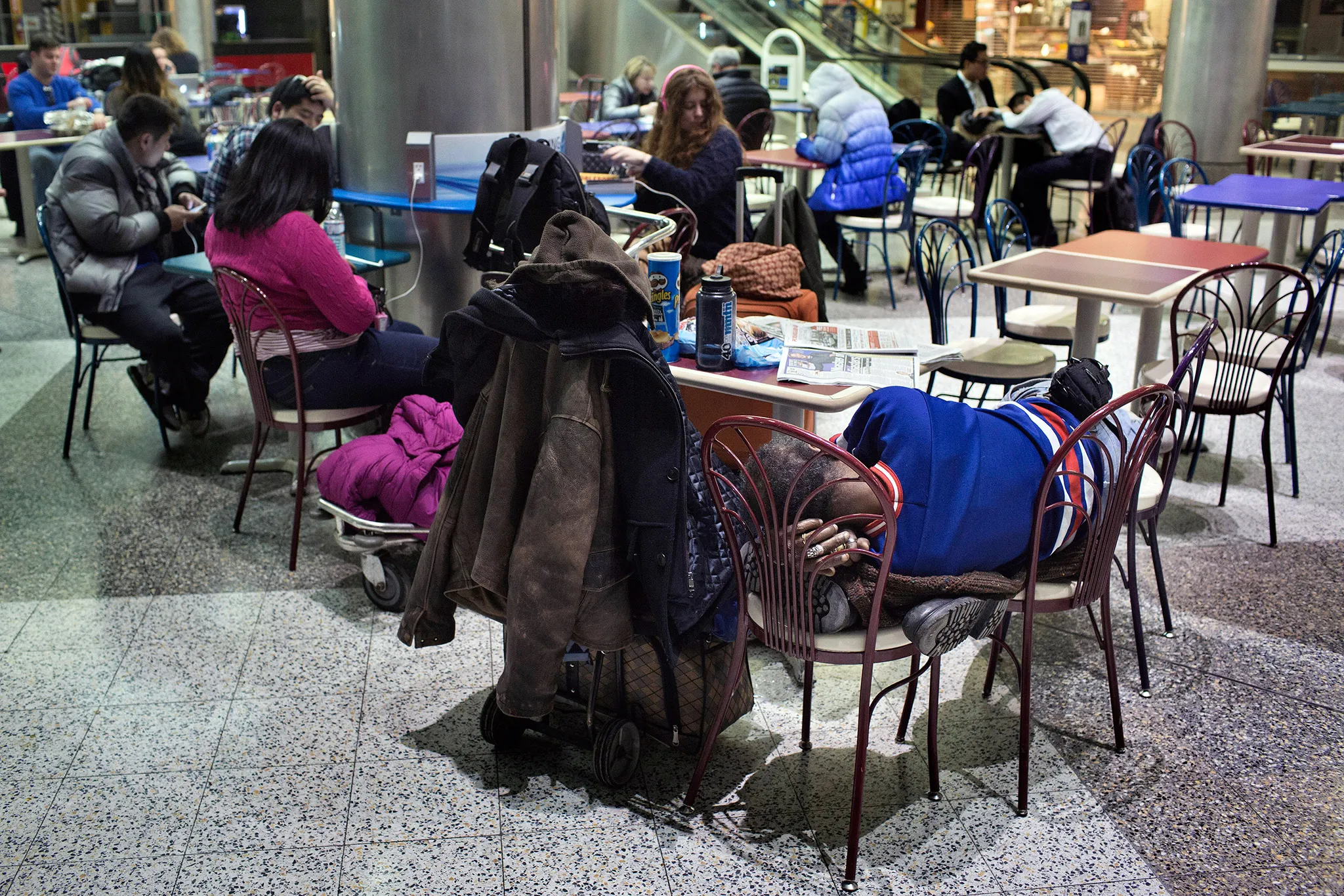 NYC's Record Homeless Population Seeks Shelter at LaGuardia - Bloomberg