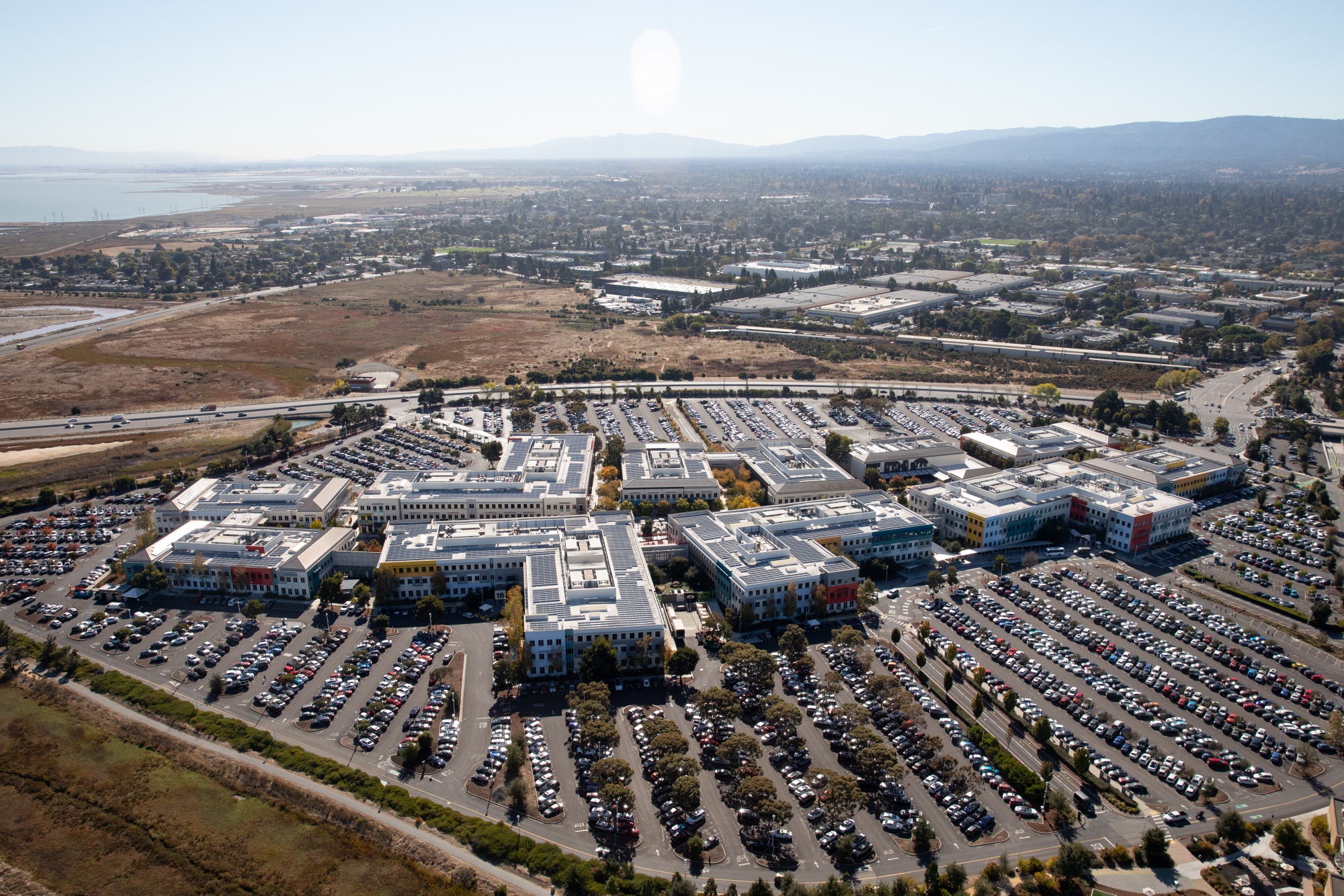 Aerial views of Silicon Valley housing and technology campuses