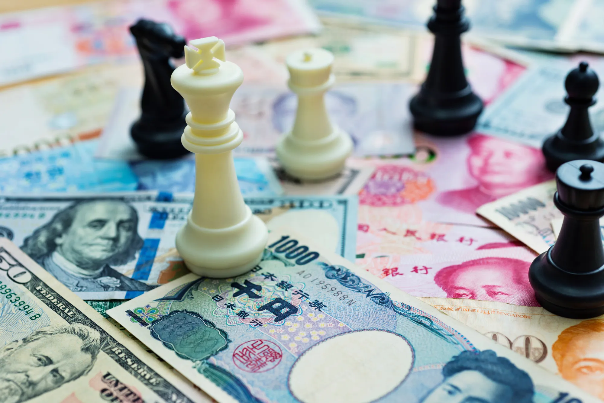 Chess pieces and paper currency