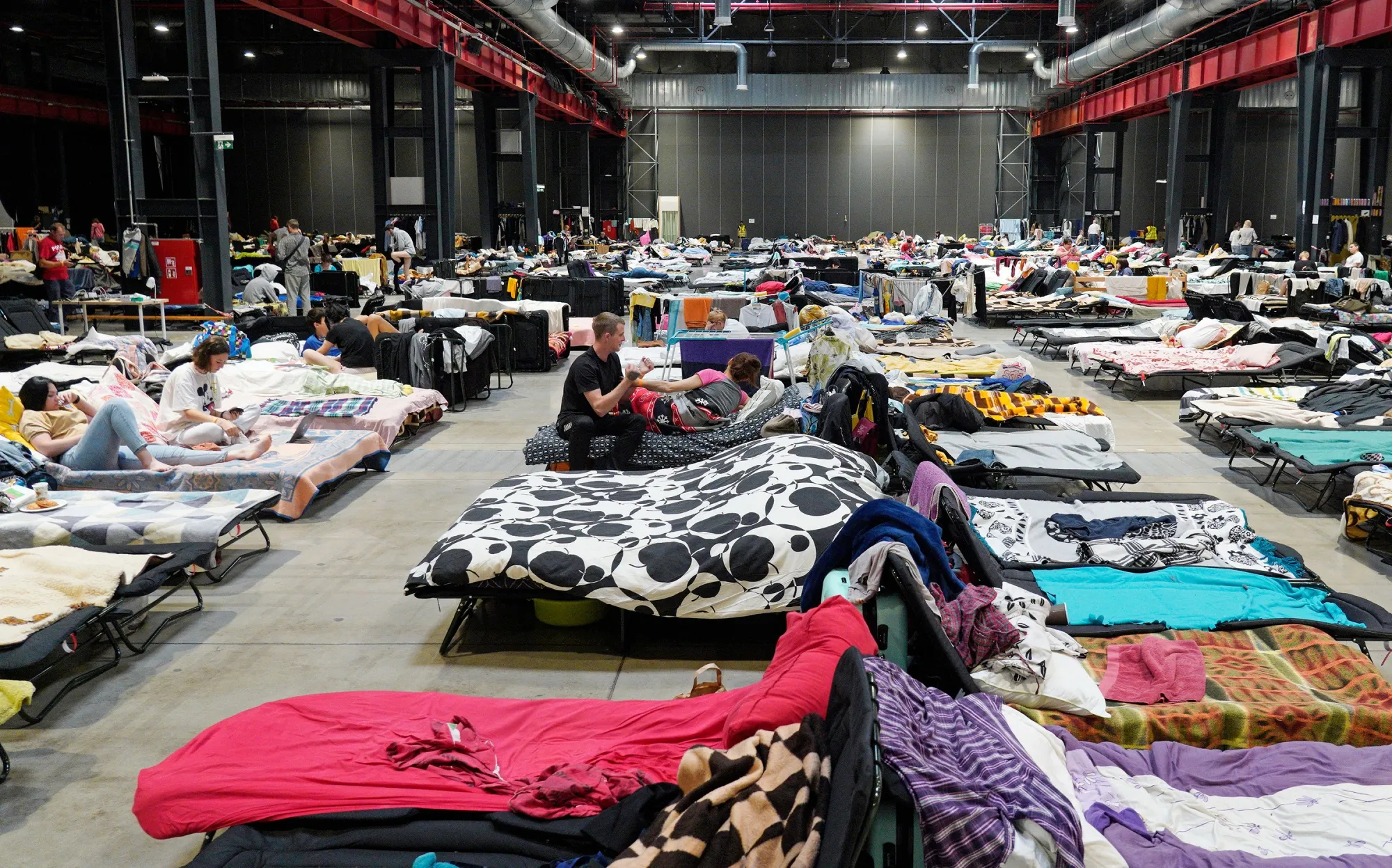 Refugees from Ukraine&nbsp;at the Humanitarian Aid Center set up at the Global Expo exhibition hall in Warsaw, Poland.&nbsp;