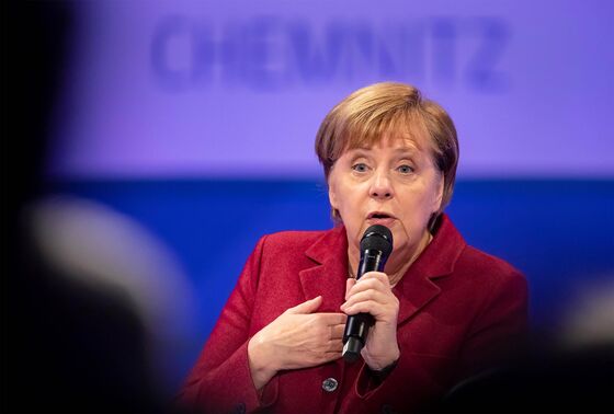 Merkel Enters Final Act Determined to Defend Immigration Stance