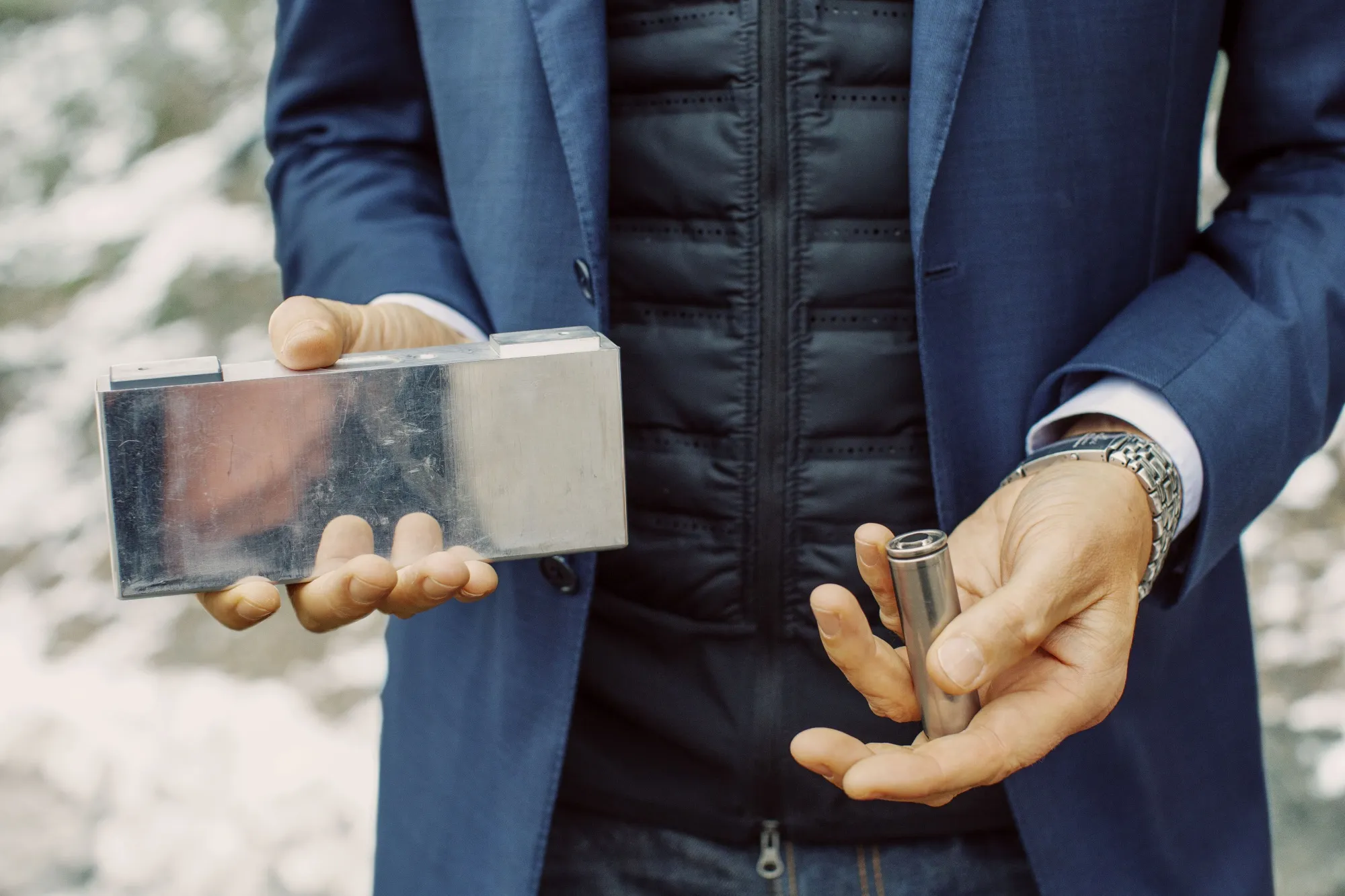 Northvolt CEO Peter Carlsson holds a prismatic cell battery, left, and a cylindrical cell battery, at the company's plant in Vasteras, Sweden.