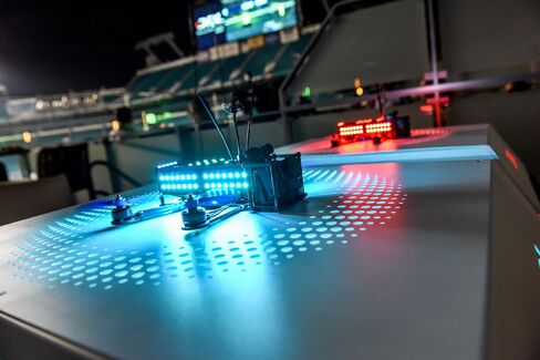 The DRL-built racing drone features four propellers and 100 color-coded LEDs. It can fly as fast as 80 miles per hour.
