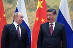 Vladimir Putin and Xi Jinping during a meeting in Beijing, on Feb. 4.&nbsp;