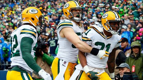 Ha Ha Clinton-Dix #21 and Clay Matthews #52 of the Green Bay Packers celebrate against the Seattle Seahawks during the 2015 NFC Championship game at CenturyLink Field on Jan. 18, 2015 in Washington.