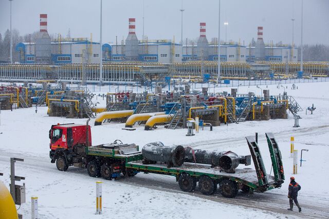 A truck transports a section of pipework through the yard at the Gazprom PJSC Slavyanskaya compressor station, the starting point of the Nord Stream 2 gas pipeline, in Ust-Luga, Russia, on Thursday, Jan. 28, 2021. Nord Stream 2 is a 1,230-kilometer (764-mile) gas pipeline that will double the capacity of the existing undersea route from Russian fields to Europe -- the original Nord Stream -- which opened in 2011.