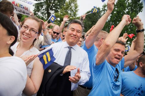 Rep. Mark Takano, D-Calif., celebrates the Supreme Court's 5-4 ruling to legalize gay marriage throughout the United States.