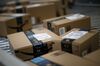 Boxes move along a conveyor belt at the Amazon.com fulfillment center in Kenosha, Wisconsin, U.S., on Tuesday, Aug. 1, 2017.