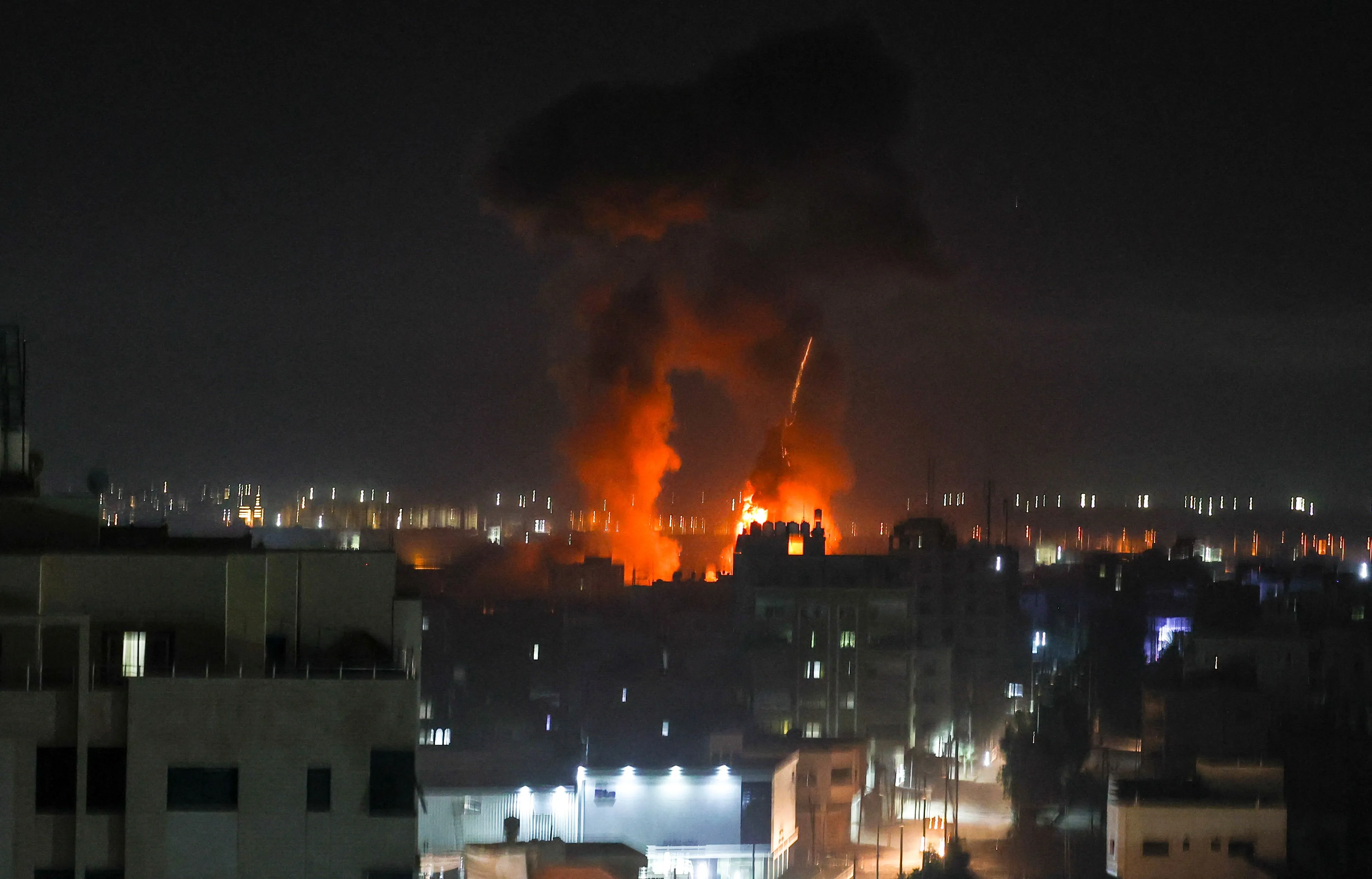 Israeli forces shell the Palestinian enclave in Gaza early on June 16.