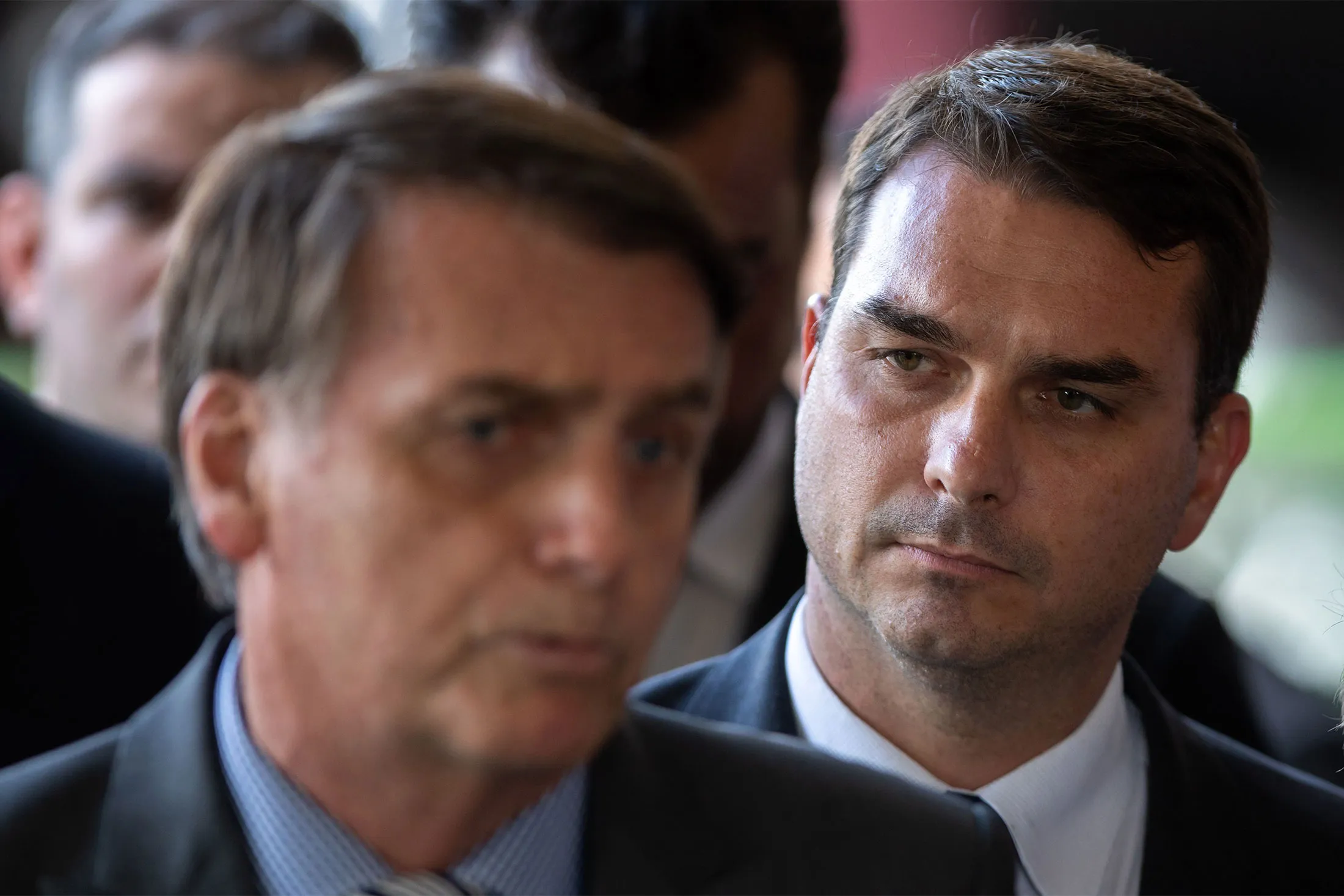 Flavio Bolsonaro, right, and his father Jair Bolsonaro.