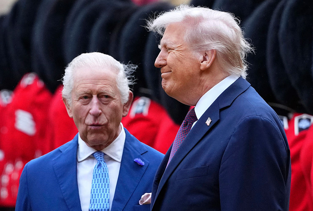 TOPSHOT - US President Donald Trump and Britain's King Charles III inspect a Guard of Honour during a Ceremonial Welcome in the Quadrangle at Windsor Castle, in Windsor, on September 17, 2025, during the US President's second State Visit. US President Donald Trump arrived in Britain for an unprecedented second State Visit, with the UK government rolling out a royal red carpet welcome to win over the mercurial leader. (Photo by Kirsty Wigglesworth / POOL / AFP) (Photo by KIRSTY WIGGLESWORTH/POOL/AFP via Getty Images) Photographer: KIRSTY WIGGLESWORTH/AFP