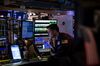 A trader works on the floor of the New York Stock Exchange (NYSE) in New York, U.S., on Friday, March 23, 2018.