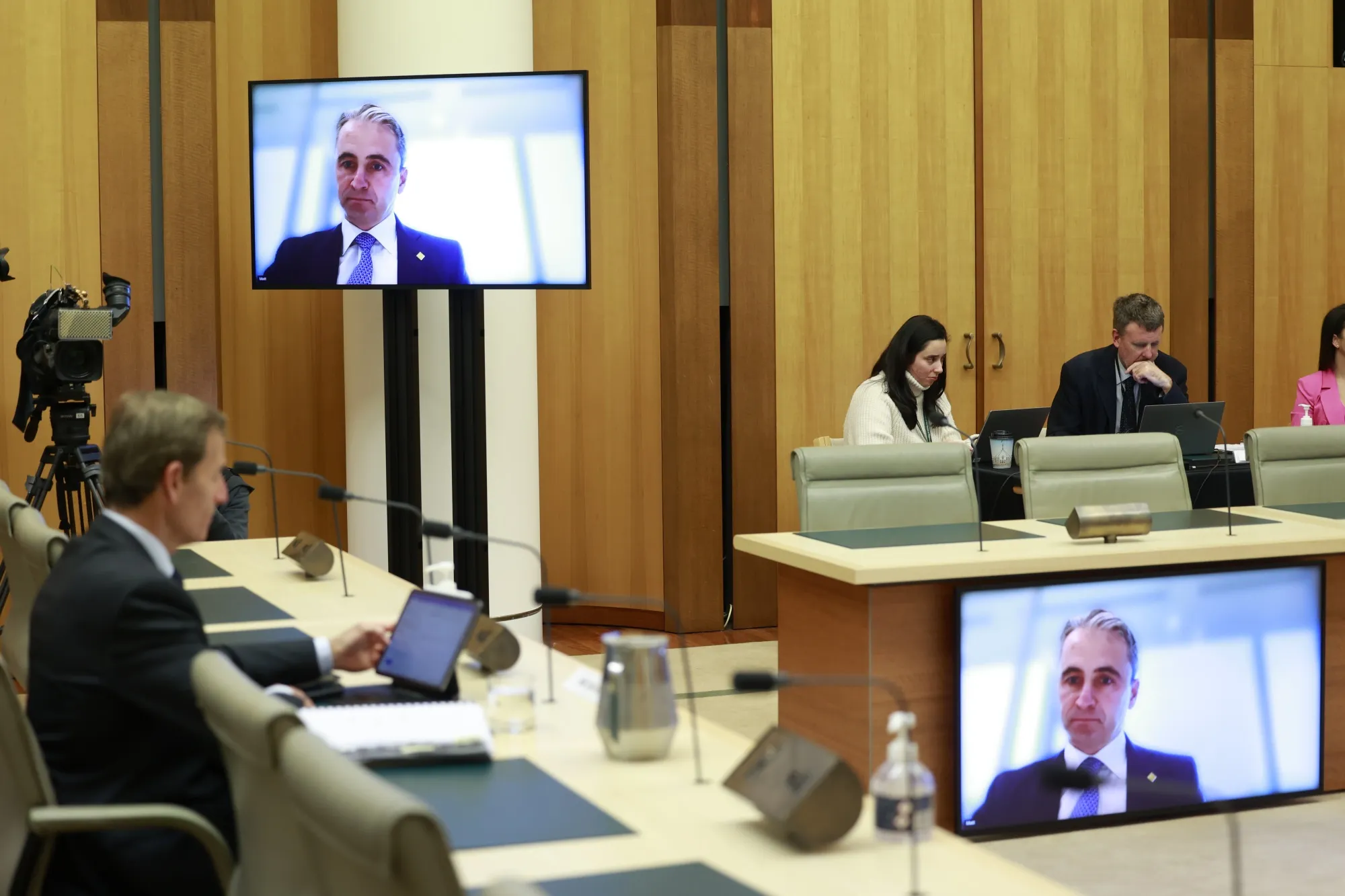 Matt Comyn speaks via a video link during a hearing on July 12.