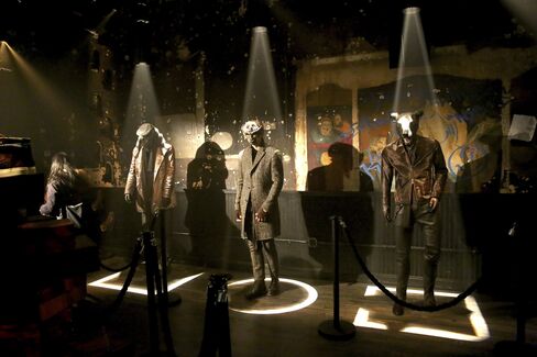 Masked models and mannequins on display at John Varvatos's atypical fall presentation at his Bowery store.
