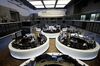 Traders monitor financial data inside the Frankfurt Stock Exchange, operated by Deutsche Boerse AG, in Frankfurt, Germany, on Wednesday, May 30, 2018. As the world ponders whether 2018 is when financial markets finally buckle after a nearly decade-long boom, there’s no shortage of potential crises to keep traders awake at night.