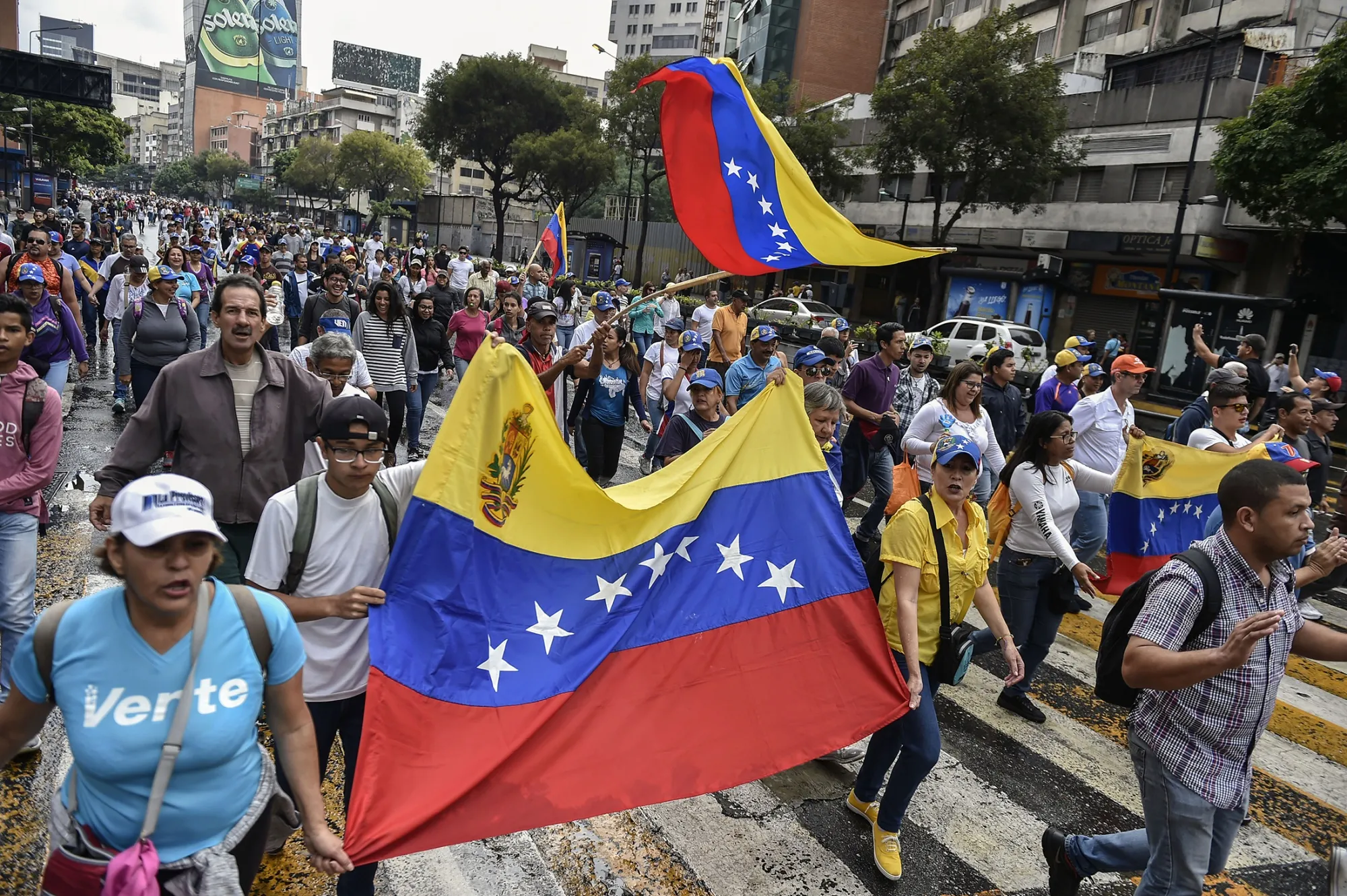 Demonstrators march in Caracas on Jan. 23.