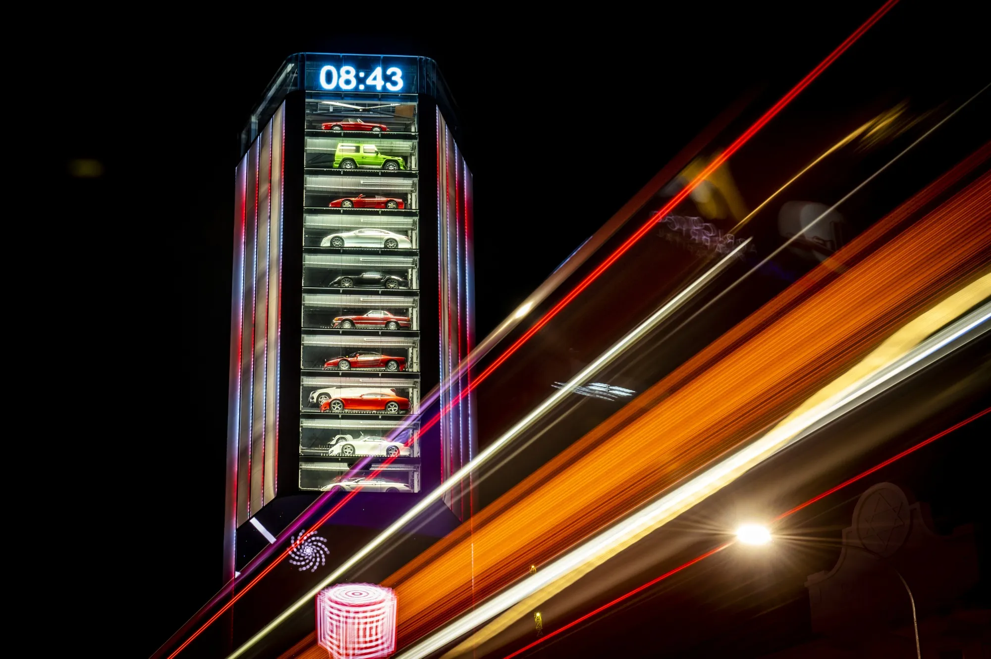 “Ten Square,” a building and luxury-car vending machine in Singapore, reflects how Singapore is attracting ultra-wealthy individual.Photographer: Edwin Koo/Bloomberg