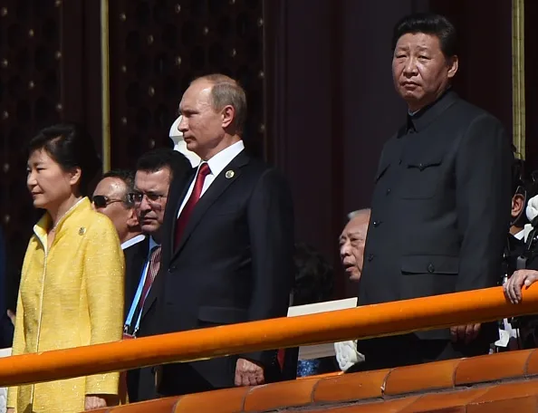 Vladimir Putin and Xi Jinping&nbsp;mark the 70th anniversary of the end of World War II. At left is South Korea’s then-president, Park Geun-hye.