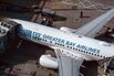 Hong Kong's Reopening Drive Curtailed by Airport Worker Shortage