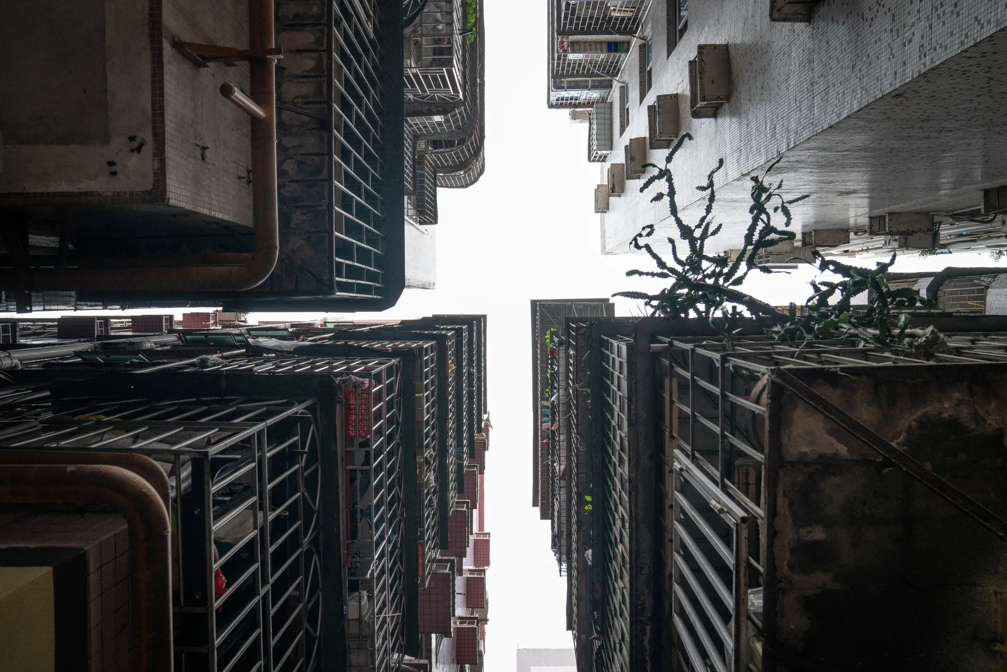 Some buildings in an urban village are so close each other that they're called "handshake buildings" in Shenzhen, China on November 21, 2020. Phtogorapher: Yan Cong/Bloomberg