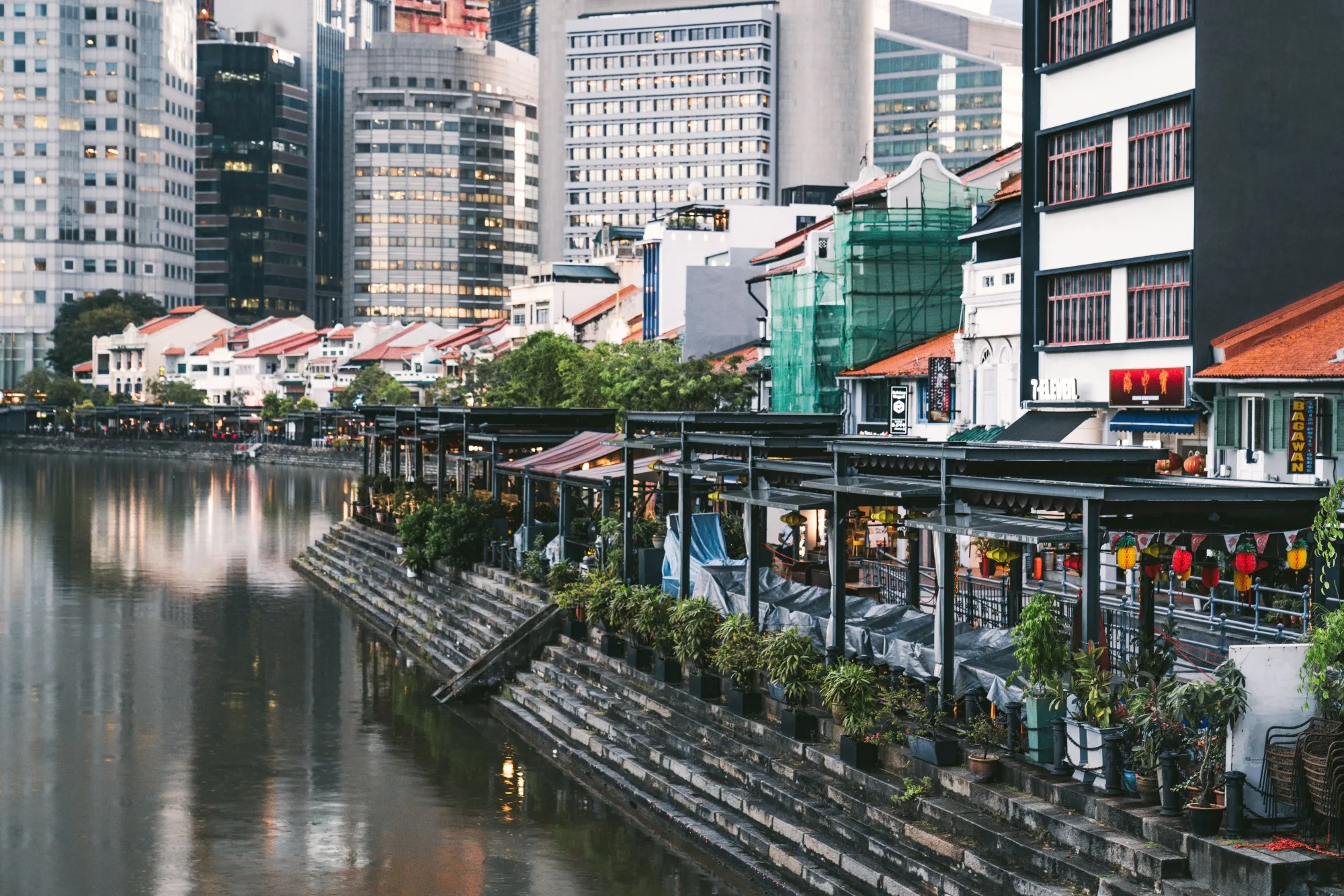 Terraces sit empty in riverside restaurants in Singapore, on March 27.