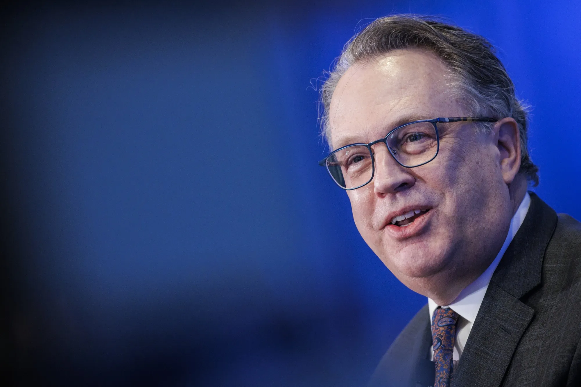 Fed’s Williams Says More Rate Cuts Likely Needed ‘Over Time’ - Bloomberg