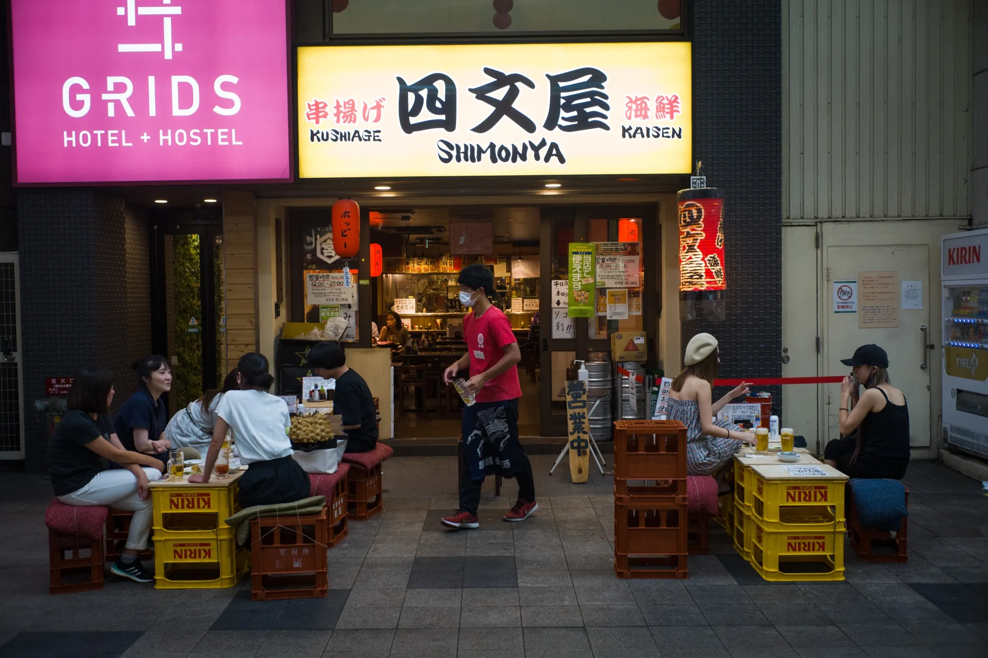 Customers at a restaurant in the Tanukikoji shopping arcade in Sapporo, Japan, on Aug. 19.